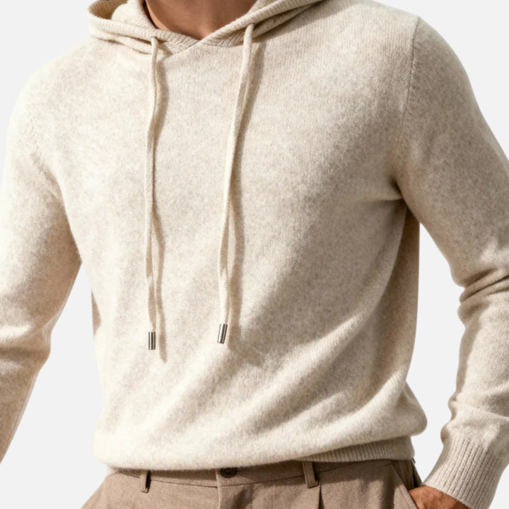 Herrarnas lyxiga hoodtröja i minimalistisk stil. Perfekt för modern, bekväm och elegant vardagslook.