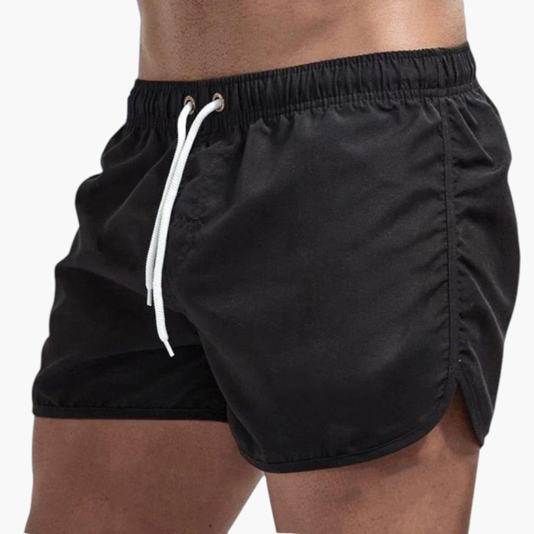 Mångfärgade herrbadbyxor med dragsko. Idealiska simshorts för sommar & strandmode.