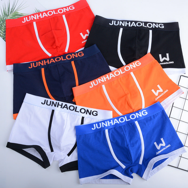 "Herrboxershorts i mittmidja, elastisk passform, mjuk bomullsblandning. Finns i färger: blå, vit, röd, svart, orange."