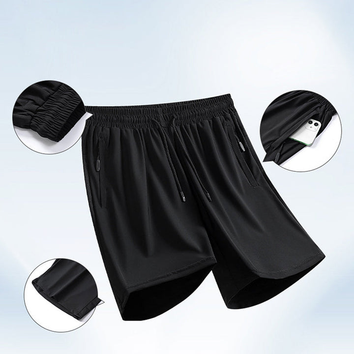 "Herrens sommar stretchiga sportshorts i grått, elastisk midja, praktiska fickor, perfekt för träning och fritid."