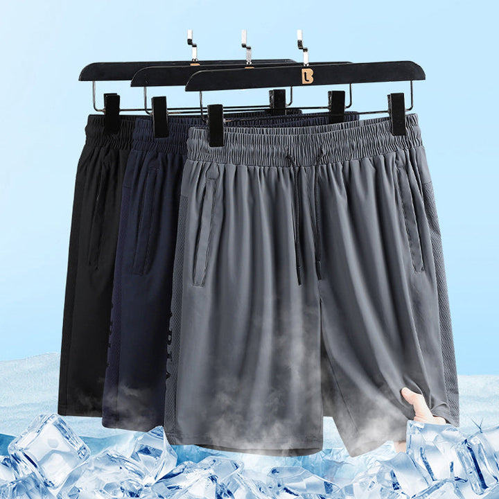 "Herrens sommar stretchiga sportshorts i grått, elastisk midja, praktiska fickor, perfekt för träning och fritid."