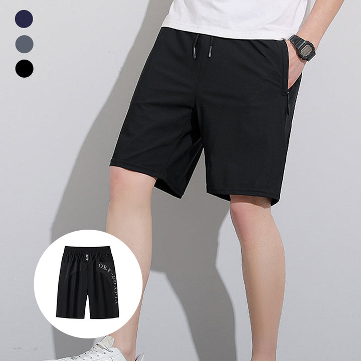 "Herrens sommar stretchiga sportshorts i grått, elastisk midja, praktiska fickor, perfekt för träning och fritid."