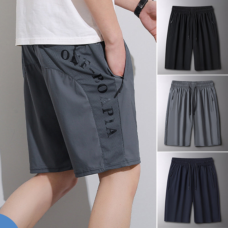 "Herrens sommar stretchiga sportshorts i grått, elastisk midja, praktiska fickor, perfekt för träning och fritid."