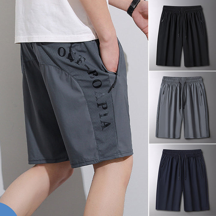 "Herrens sommar stretchiga sportshorts i grått, elastisk midja, praktiska fickor, perfekt för träning och fritid."
