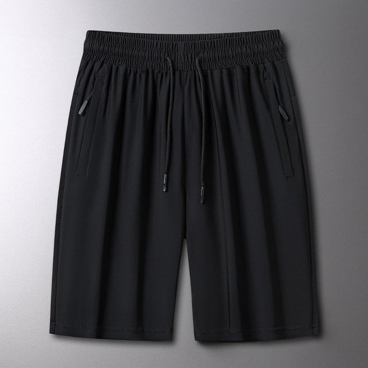 "Herrens sommar stretchiga sportshorts i grått, elastisk midja, praktiska fickor, perfekt för träning och fritid."