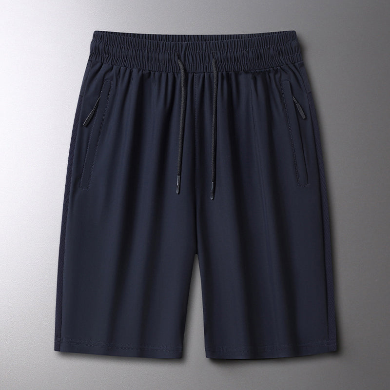 "Herrens sommar stretchiga sportshorts i grått, elastisk midja, praktiska fickor, perfekt för träning och fritid."