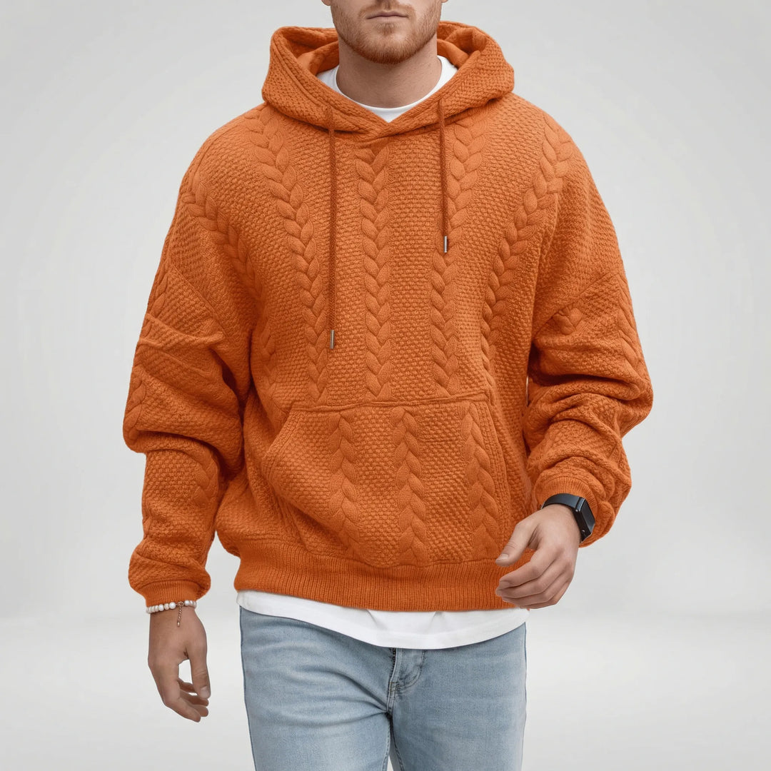 Mjuk herr pullover hoodie Logan med detaljerat flätmönster. Bekväm och trendig för en avslappnad stil.
