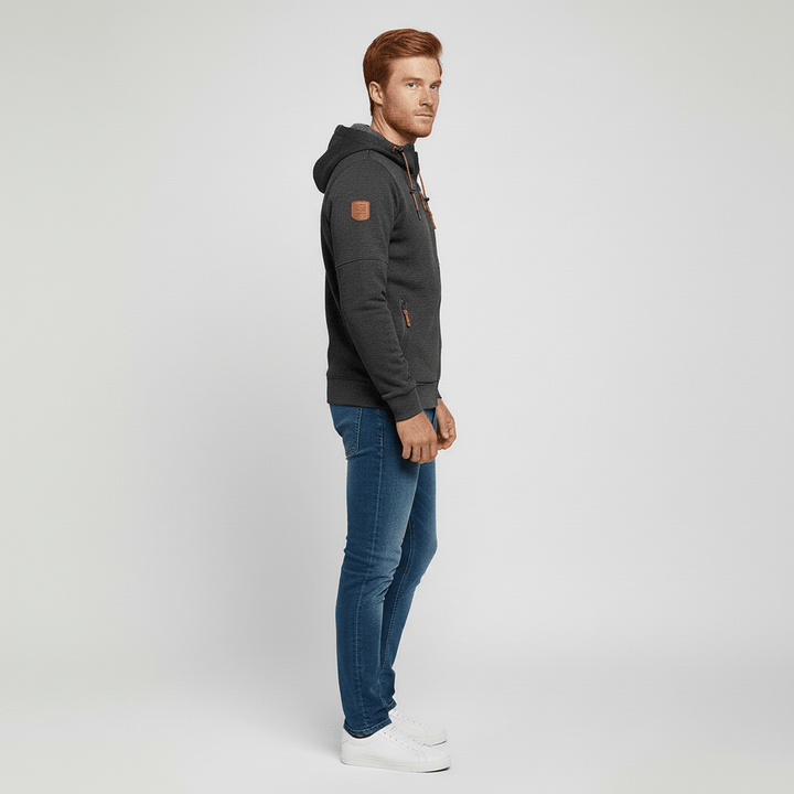 Svart hoodie för herrar med dragkedja och huva. Mjuk vardagsjacka för alla tillfällen.