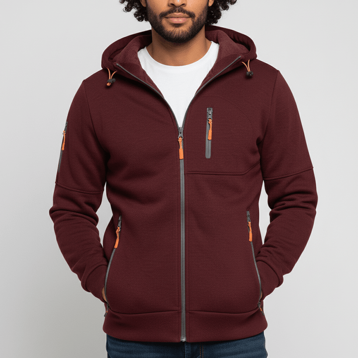 Herrjacka, svart hoodie med huva och dragkedja. Funktionell vardagsjacka för en aktiv livsstil.