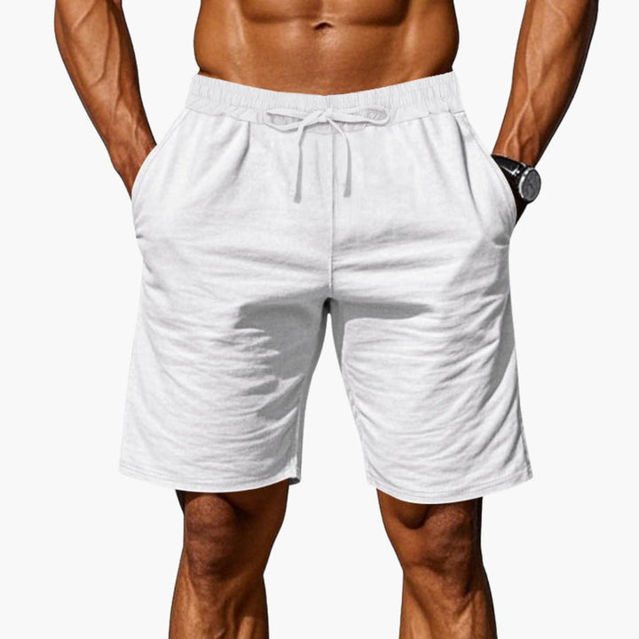 Herrshorts med elastisk midja och praktiska fickor för bekväm fritid. Stilrena sommarshorts.