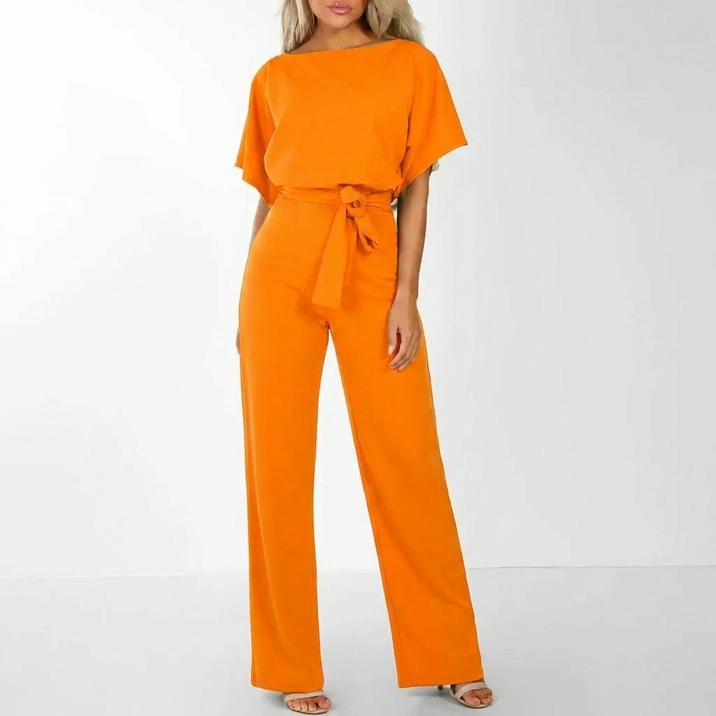 Elegant jumpsuit för dam i svart med markerande skärp i midjan för fest