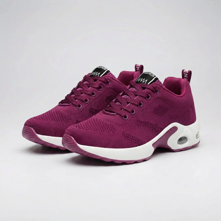 Bekväm unisex-sneaker från sidan som visar den moderna designen