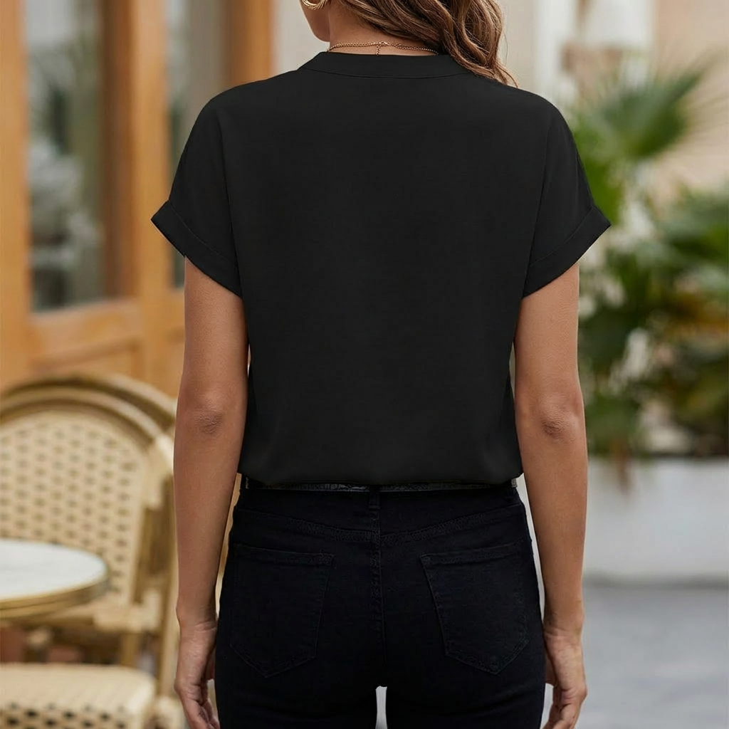 Baksida av svart elegant blus för damer