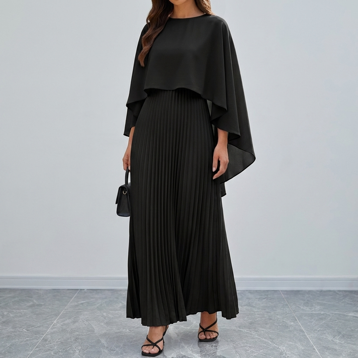 Elegant dam maxiklänning med långa batwing-ärmar och vackra veck i lång modell