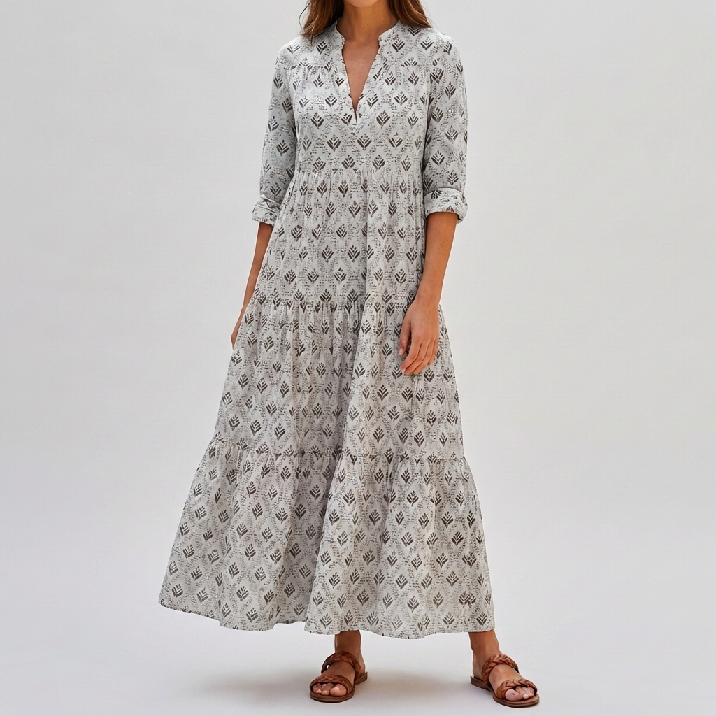 Elegant damklänning i boho-stil sedd bakifrån med flytande passform