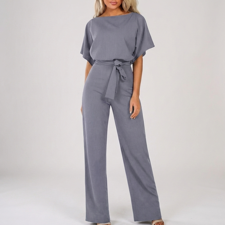 Snygg jumpsuit för dam med V-ringning och knytbälte