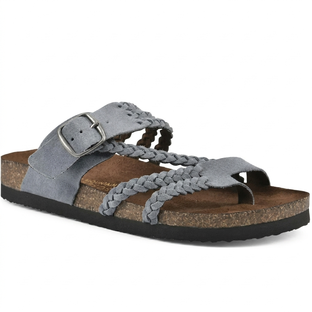 Platta damsandaler med eleganta vävda remmar i en snygg sommarstil