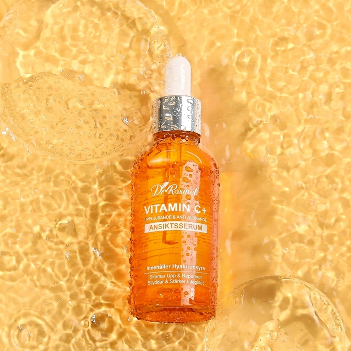 Droppflaska med fuktgivande vitamin c serum för ansiktet som skyddar mot fria radikaler och ger glow