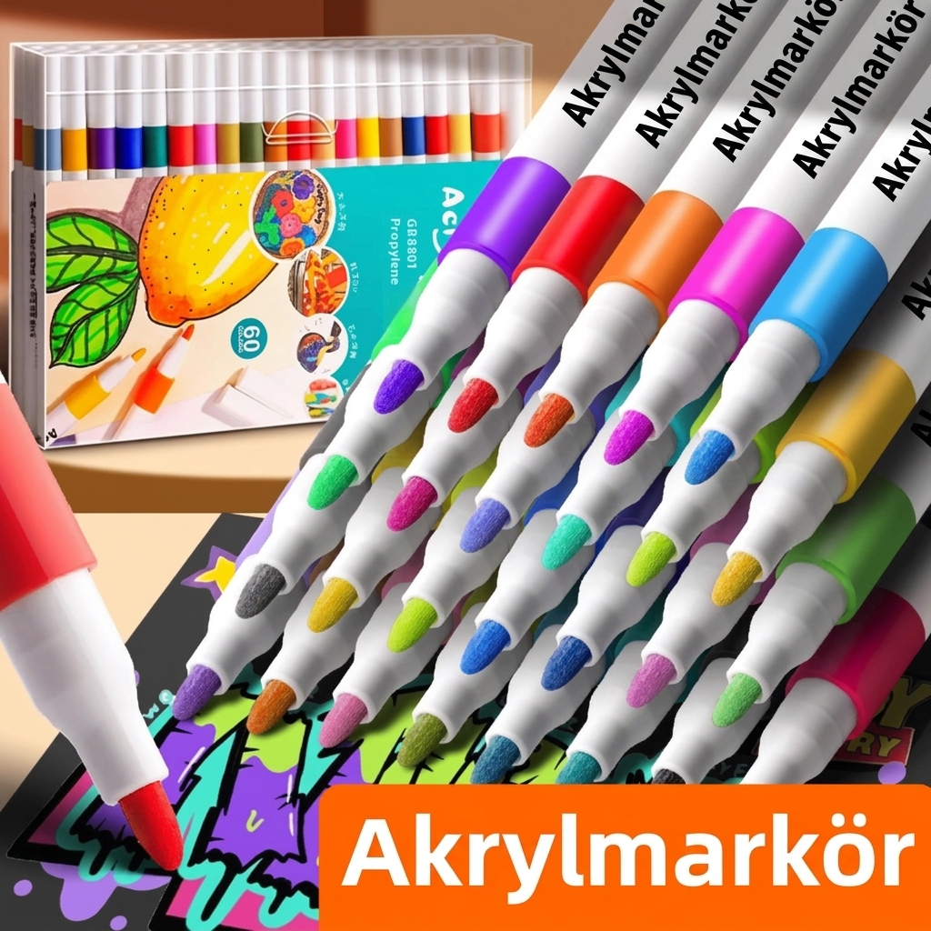 Stort set med akrylmålarpennor i flera färger samt provteckning