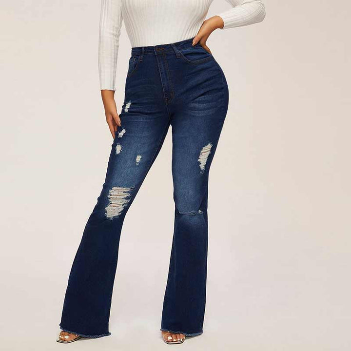 Damjeans med hög midja, utsvängda ben och slitna detaljer, trendig siluett för moderiktig stil och komfort.