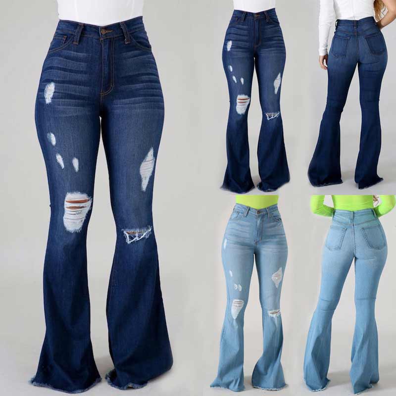 Damjeans med hög midja, utsvängda ben och slitna detaljer, trendig siluett för moderiktig stil och komfort.