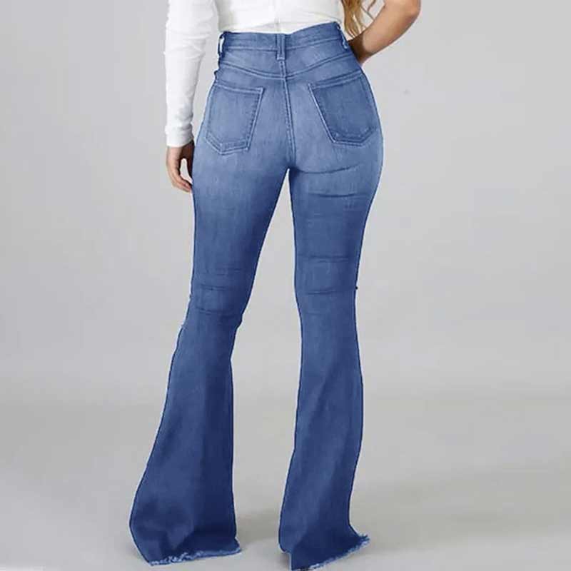 Damjeans med hög midja, utsvängda ben och slitna detaljer, trendig siluett för moderiktig stil och komfort.