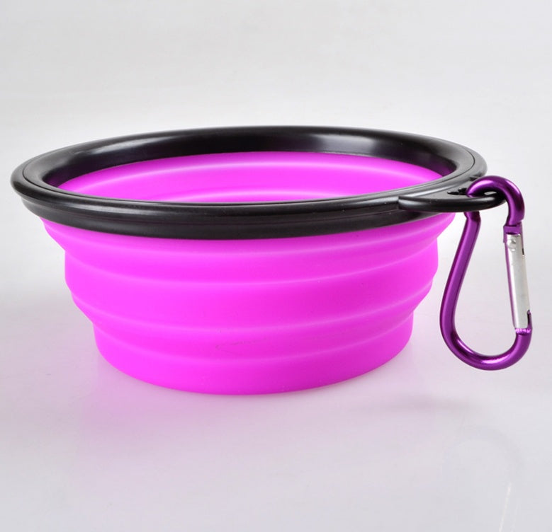 Röd portabel hundskål, hopfällbar design. Viktig matskål för valpar på språng.