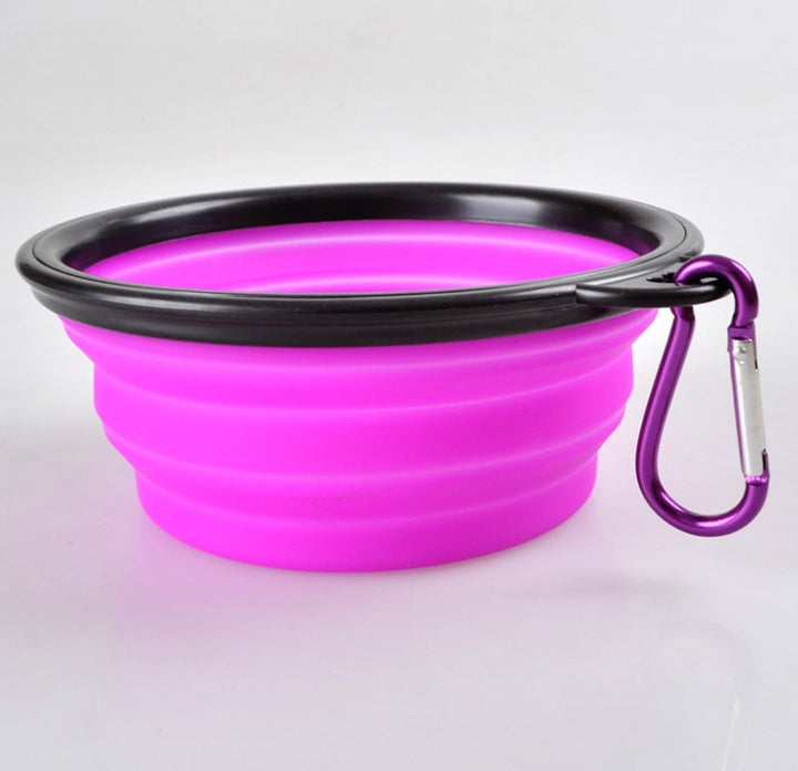 Röd portabel hundskål, hopfällbar design. Viktig matskål för valpar på språng.