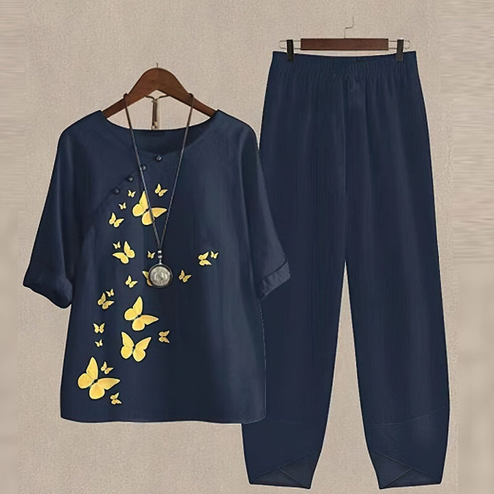 Snygg blommig damblus från det luftiga sommarsetet i storlekar S-5XL.