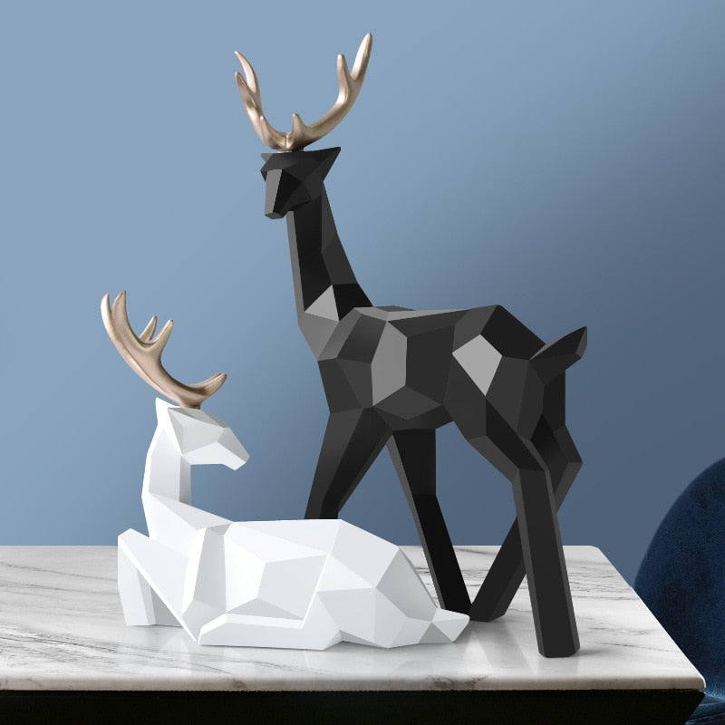 Abstrakt skulptur av hjortpar i modern design mot neutral bakgrund, heminredning
