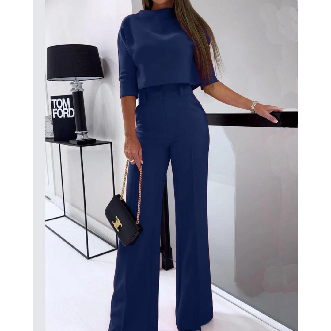 Elegant tvådelat damset med crop top och vida byxor i festlig stil