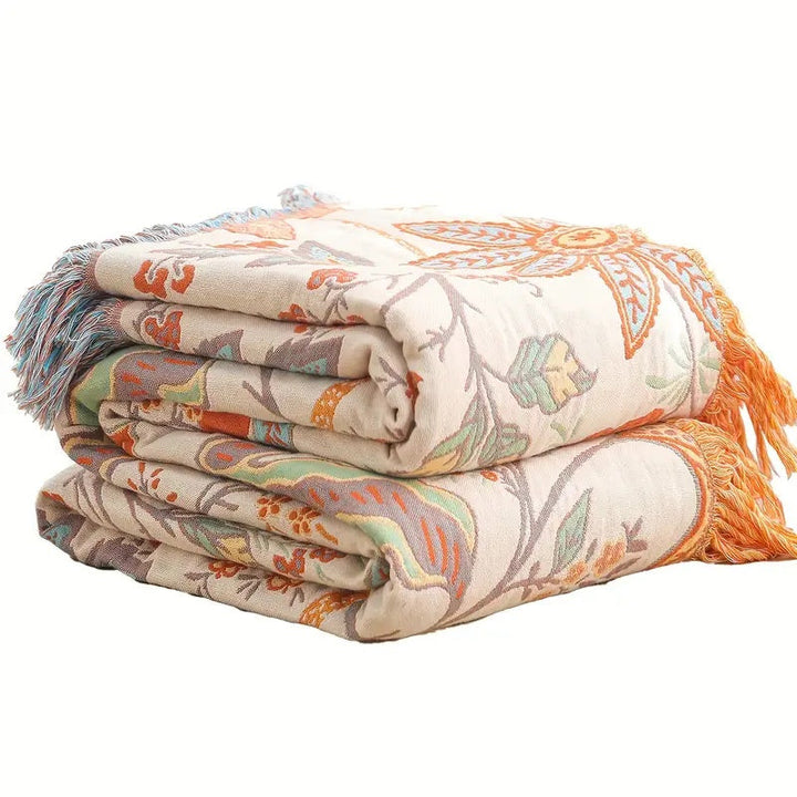 Vikta blommiga filtar med fransar i boho-design