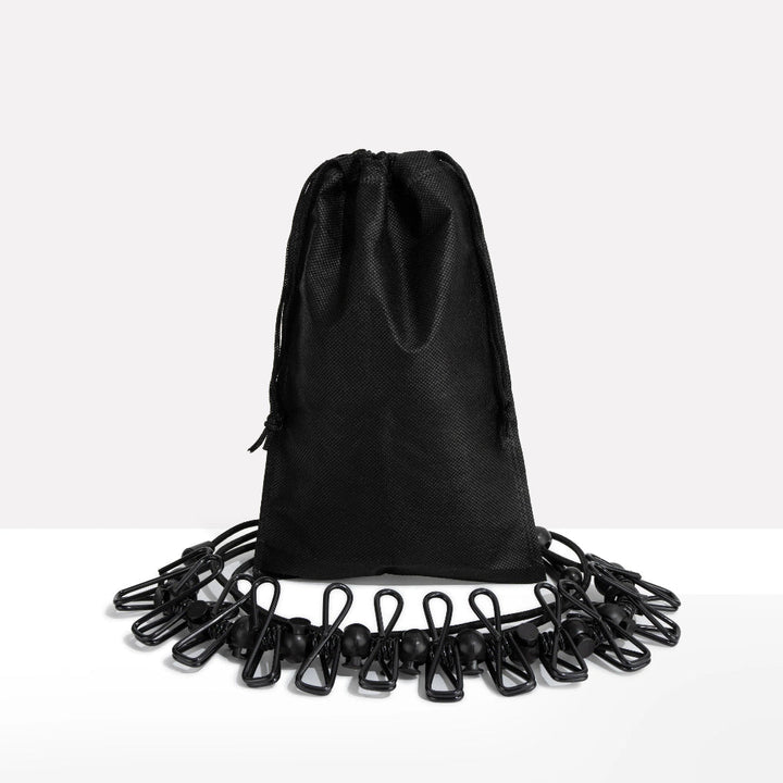 Svart bärbar klädstreck i förvaringspåse för resor