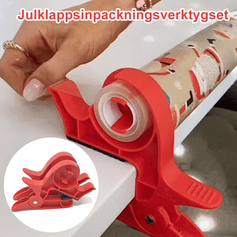 "Inslagningverktyg i röd och grå plast för presentinpackning, justerbar för olika pappersstorlekar."