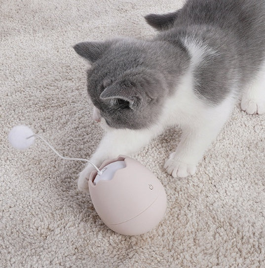 Kattens jaktinstinkt: elektronisk kattleksak med snurrande boll för mental och fysisk stimulans.