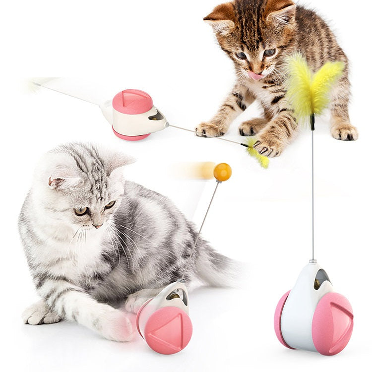 Katt leker entusiastiskt med självbalanserande interaktiv kattleksak; främjar fysisk aktivering.