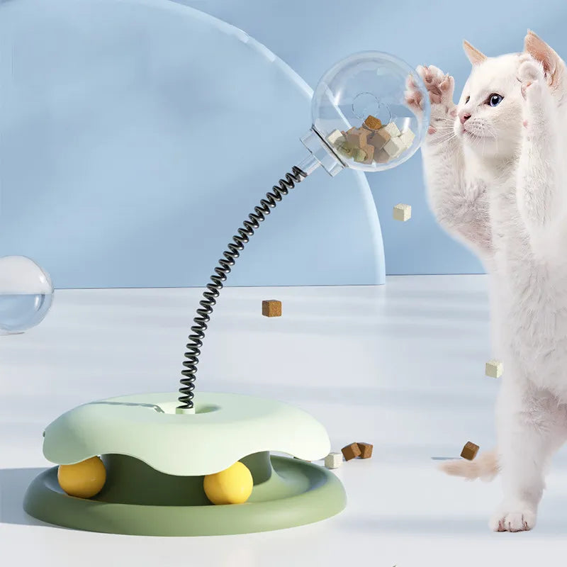 Interaktivt kattspel med godisdispenser för innekatt. Stimulerande aktiveringsleksak.