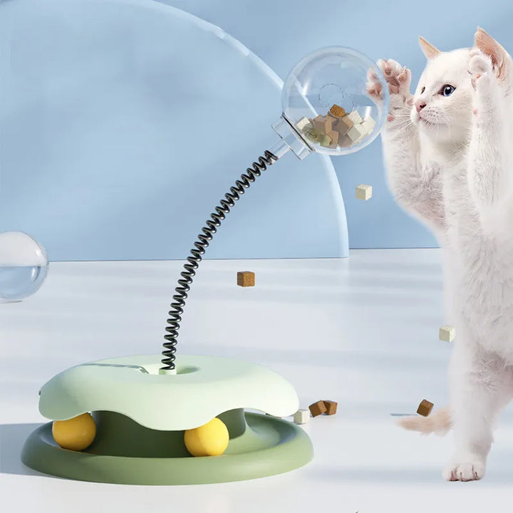 Interaktivt kattspel med godisdispenser för innekatt. Stimulerande aktiveringsleksak.