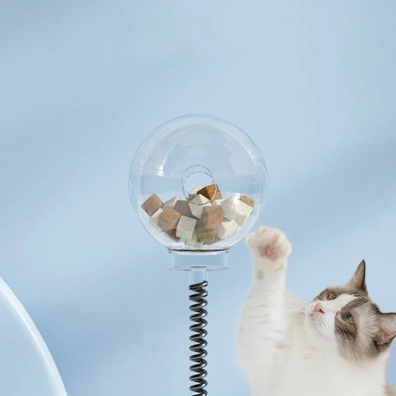 Färgglatt kattspel med godisdispenser. Engagerande aktiveringsleksak för lekfulla katter.