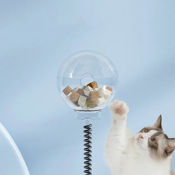 Färgglatt kattspel med godisdispenser. Engagerande aktiveringsleksak för lekfulla katter.
