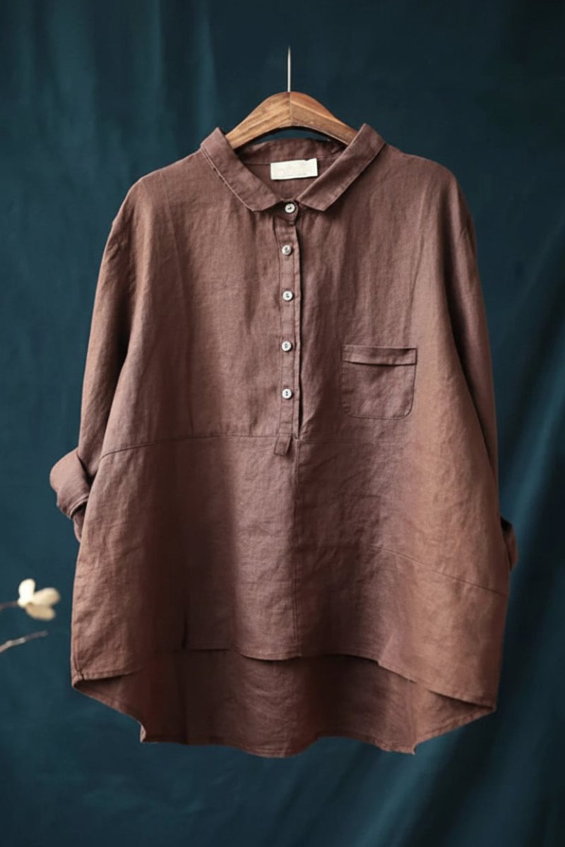 Dam blus i jade, med knappar. Kombinera för trendig vardagslook med avslappnad komfort.