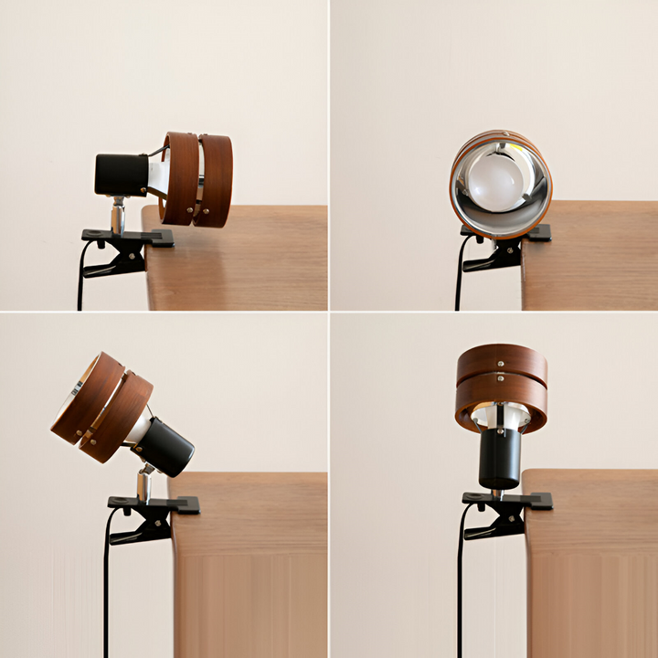 Japanskinspirerad klämlampa monterad på hylla, justerbar design i trä för accentbelysning.