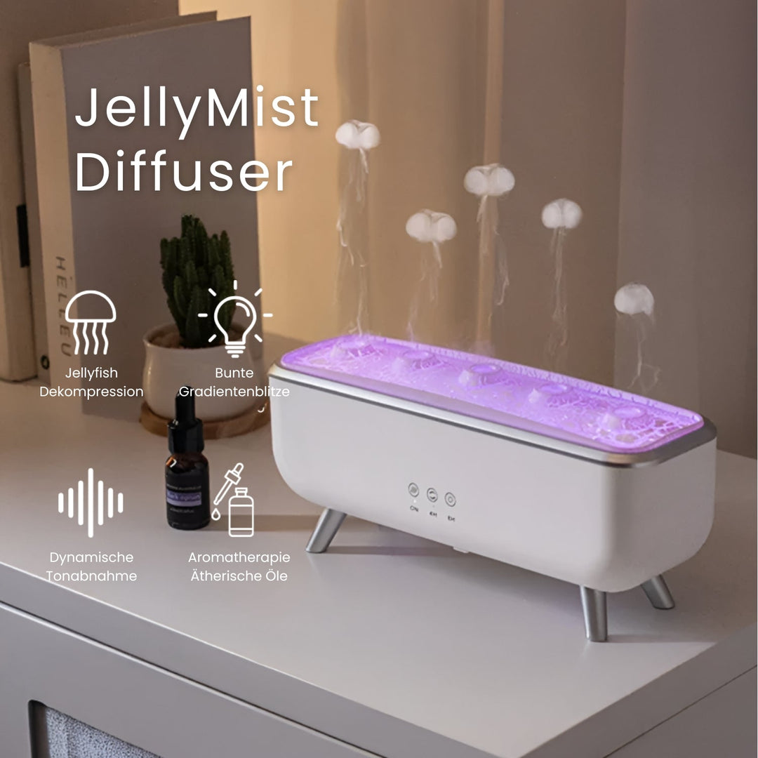 JellyMist diffuser förpackad med tillbehör och doftolja på bord
