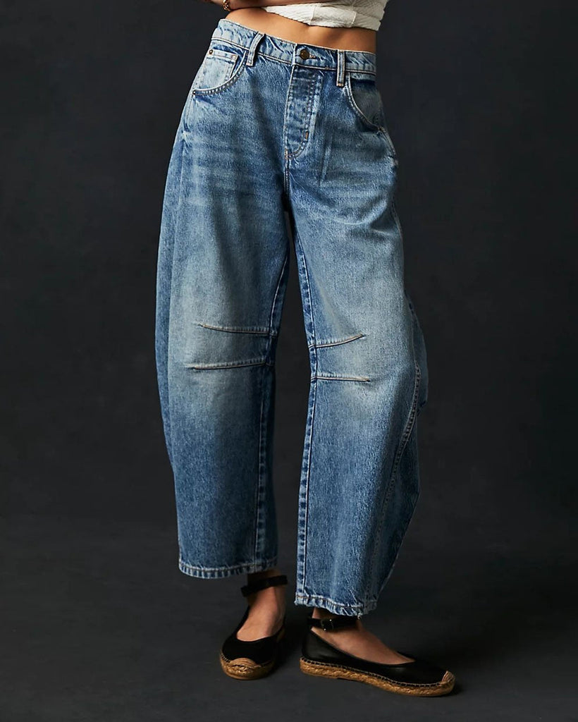 Blå dam-jeans med sliten finish och ankellängd