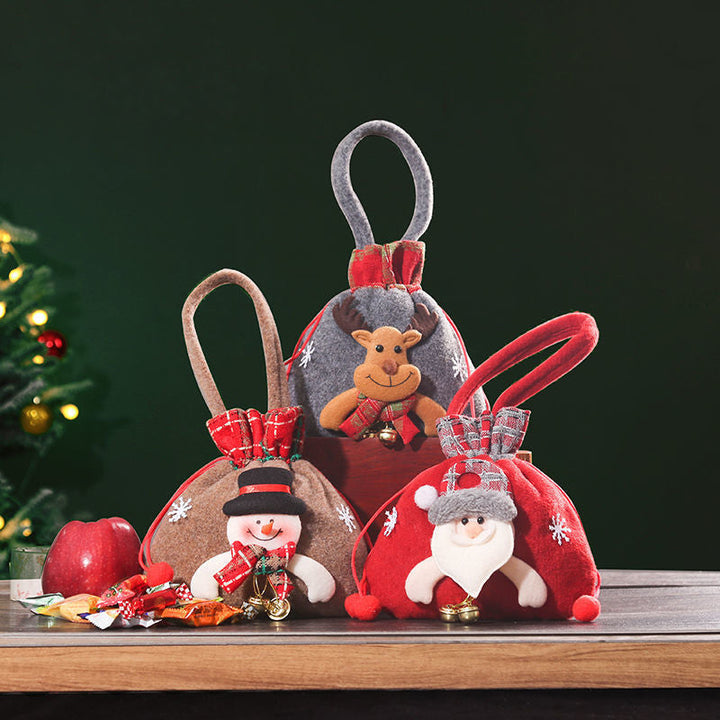 "Julklappspåsar i plysch och burlap med dragsnöre, perfekt för små gåvor, finns i snögubbe, jultomte och renar."