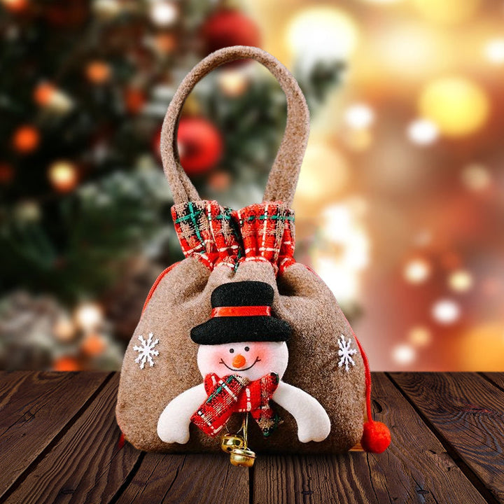 "Julklappspåsar i plysch och burlap med dragsnöre, perfekt för små gåvor, finns i snögubbe, jultomte och renar."