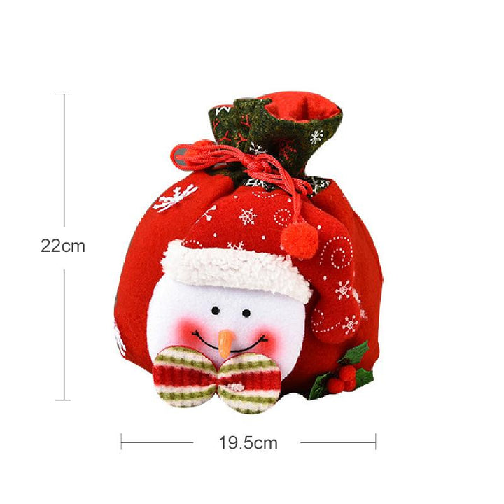 "Julklappspåsar med Jultomte, Ren, Snögubbe och Nallebjörn mönster, perfekta för att dekorera och ge gåvor till jul."