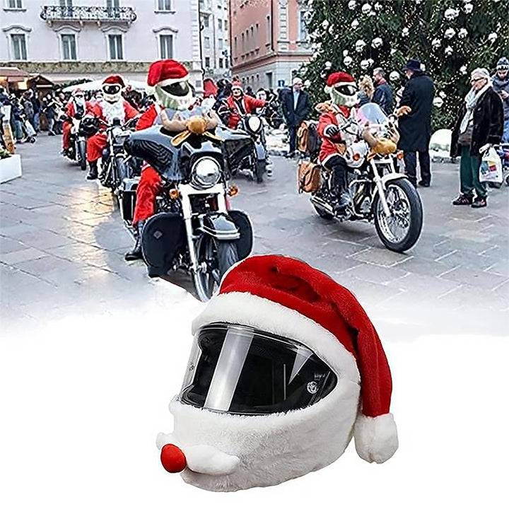"Julmotorcykelhjälmskydd med tomtemotiv, röd och vit design, ger festlig känsla och skydd under julens motorcykelturer."