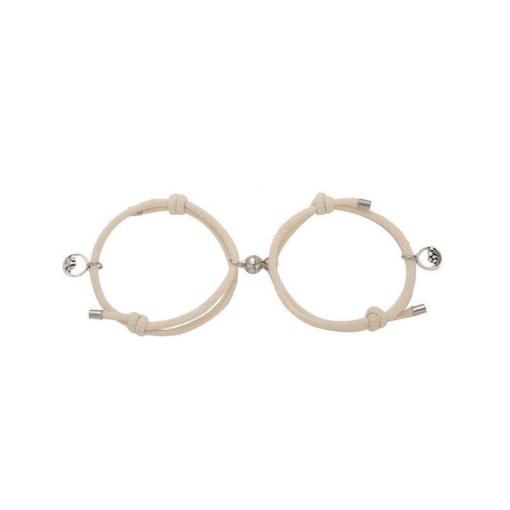 "Justerbara magnetiska armband för par, nickelfria, svart och rött rep med metallspänne, symboliserar lojalitet och kärlek."