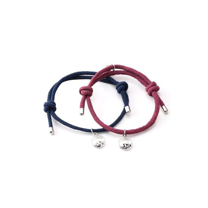 "Justerbara magnetiska armband för par, nickelfria, svart och rött rep med metallspänne, symboliserar lojalitet och kärlek."